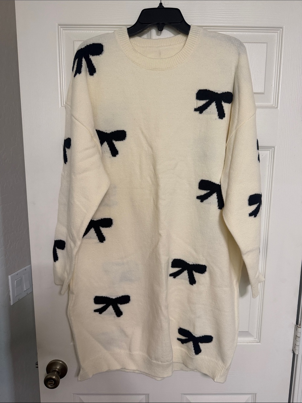 SHEIN Cream Sweater Dress with Black Bow Pattern